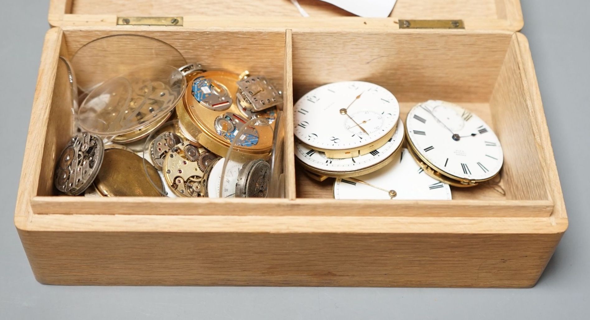 A small group of assorted wrist and pocket watch movements and dials, including Zenith.